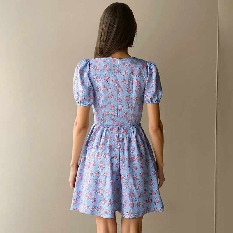 Hugcitar 2025 Floral Print V Neck Short Sleeve Lace Up Zip Up Sexy Slim Pleated Mini Dress Summer Elegant Outfits Party Vacation
